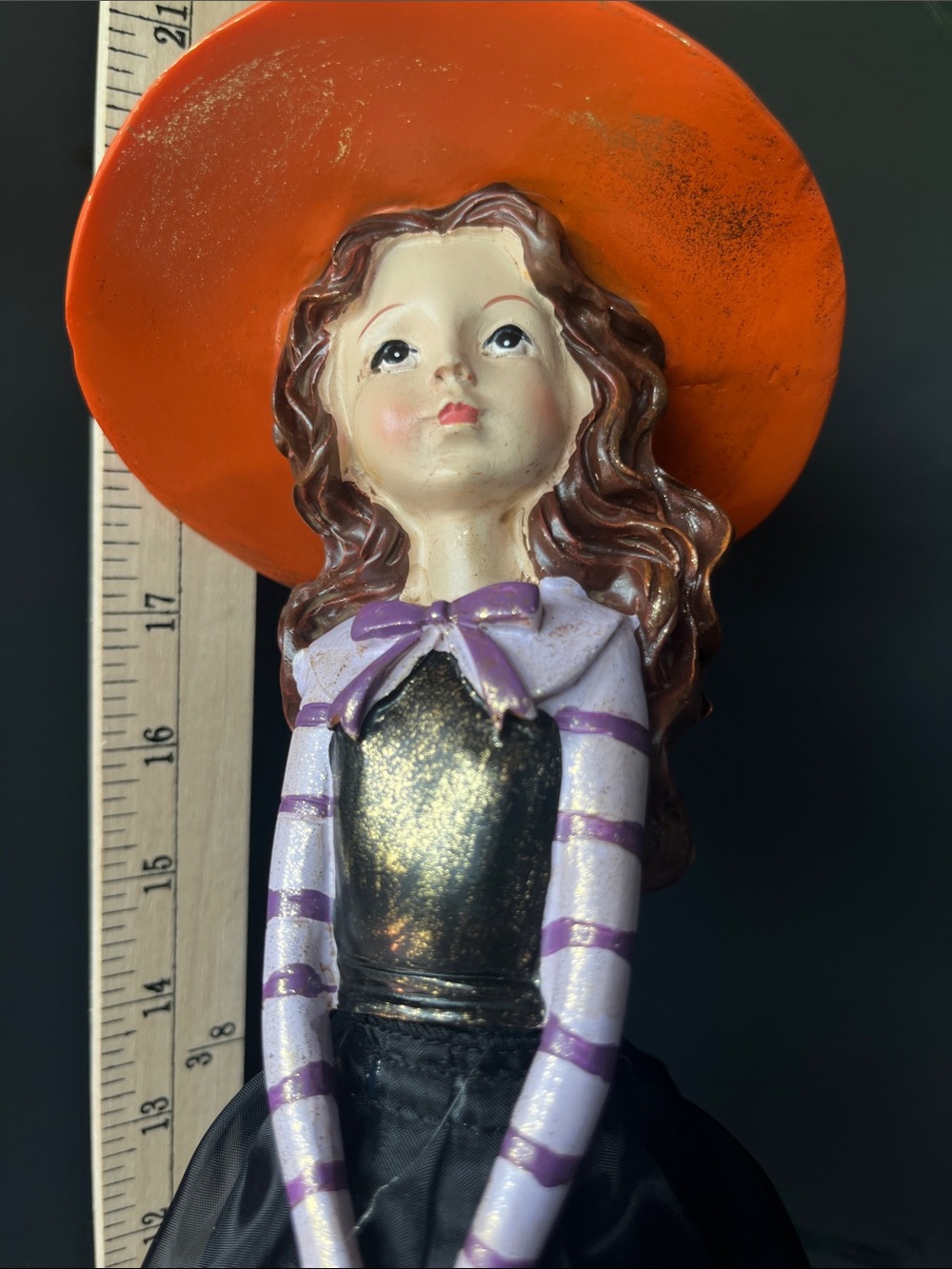 Decorative Girl Figurine with Orange Hat - Purple Accent Home Accent